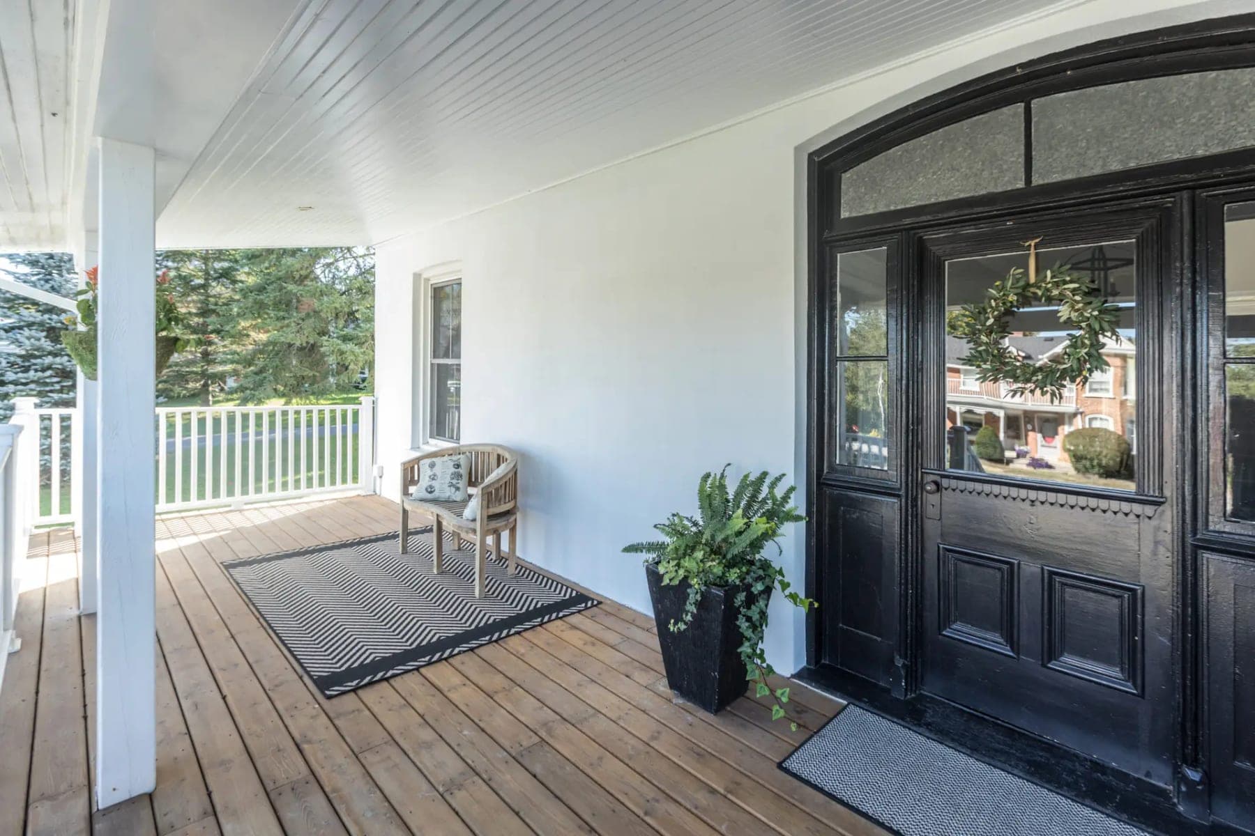 Freshly stained backyard deck with restored wood grain