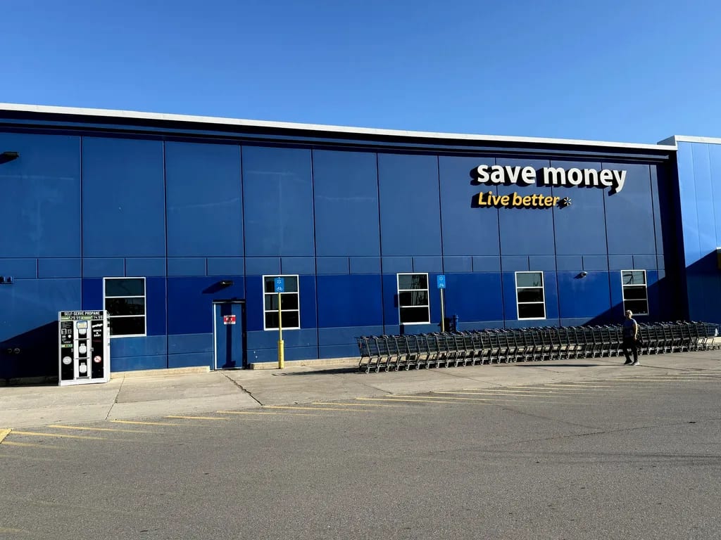 Walmart storefront after concrete coating restoration and blue repainting by Sigma Painting in the Greater Toronto Area