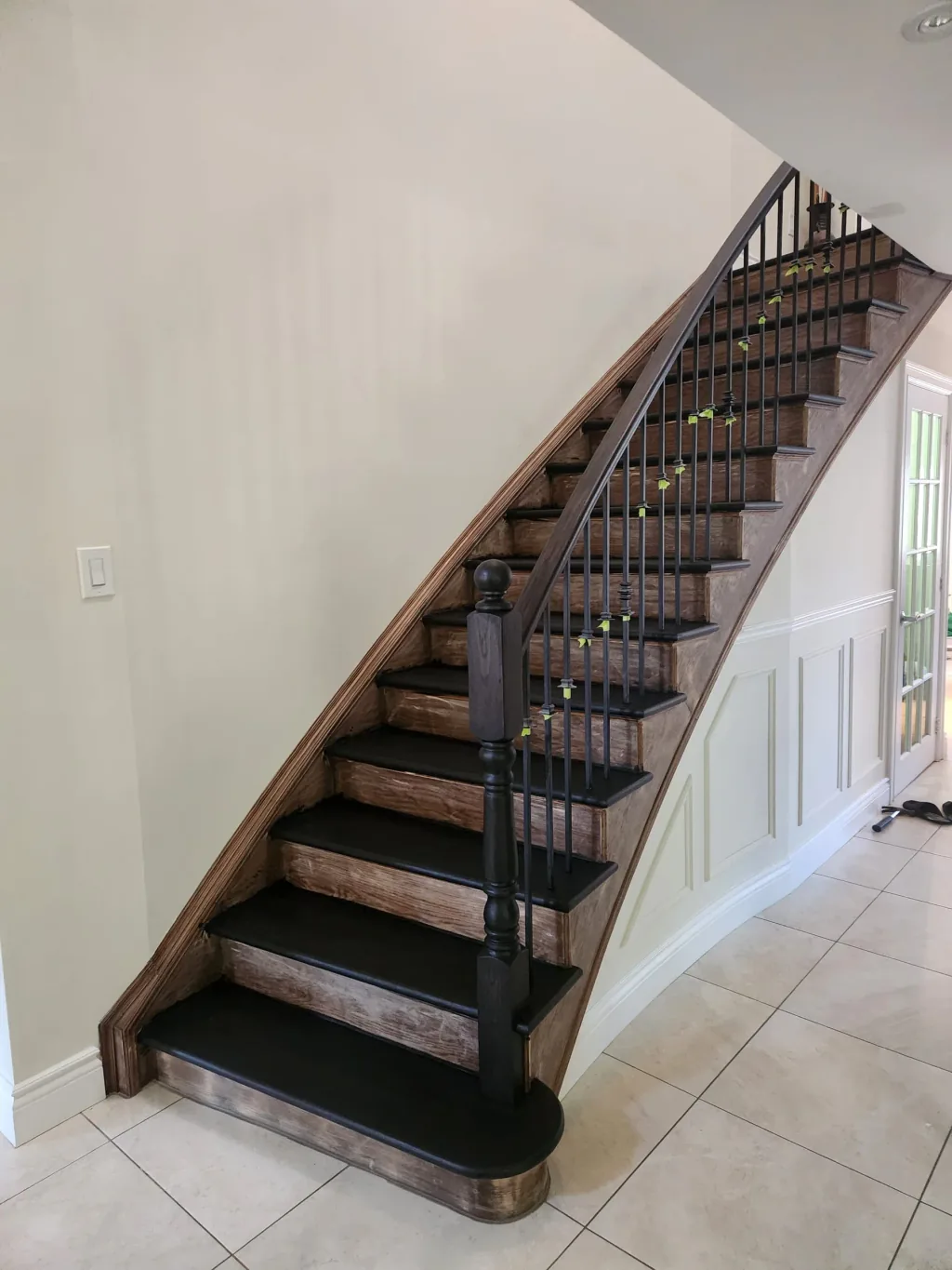 Before — original hardwood staircase before Sigma Painting refinishing in King City