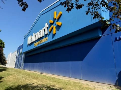 Walmart Supercentre sign above the blue exterior at a Sigma Painting project in the Greater Toronto Area