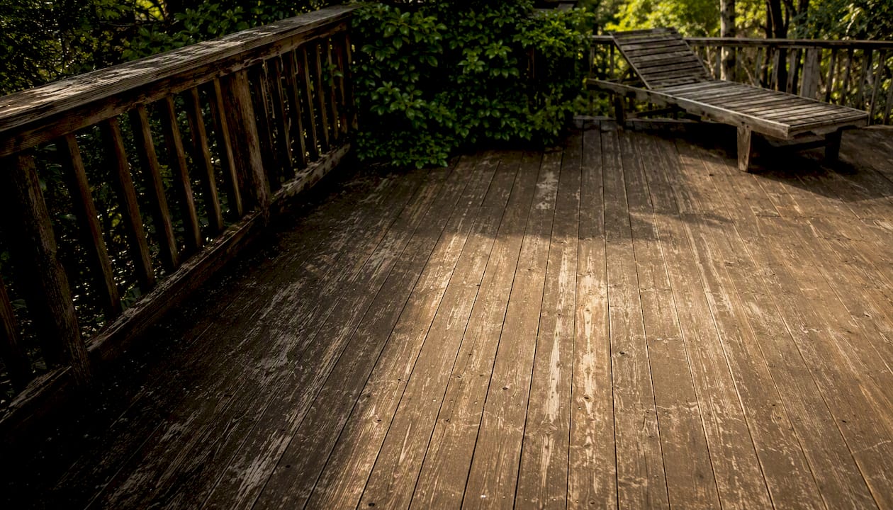 Abraded wooden deck boards from foot traffic