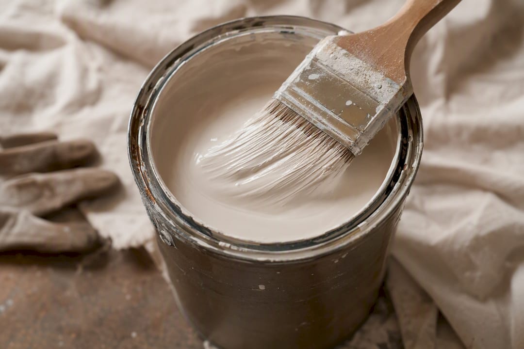 Close-up of paint brush with acrylic latex paint